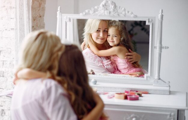 mother-and-daughter-gather-in-the-morning-in-front-of-a-mirror_1157-29536-626x400.jpg